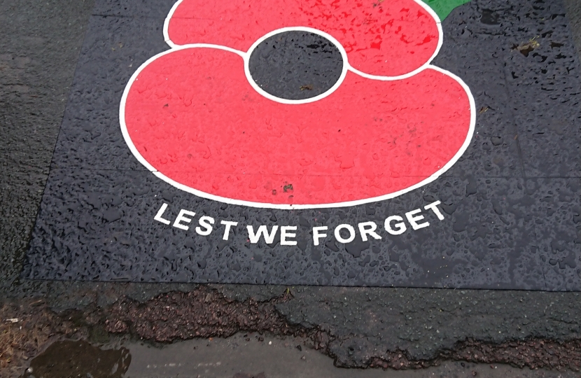 Stoke Gifford War Memorial pavement poppy
