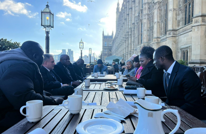 Jack Lopresti MP having tea with the Ghana Community Bristol on the terrace of the Houses of Parliament