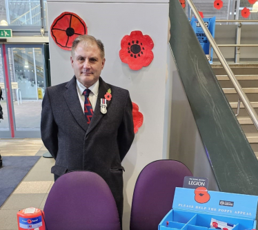 Jack helping with the poppy appeal at Bristol Parkway Railway Station